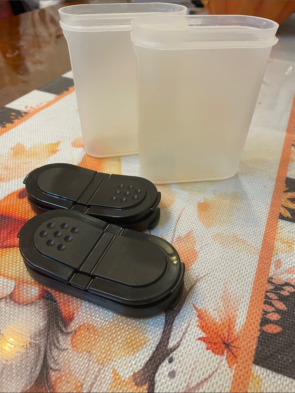 Two Tupperware Seasoning Shakers